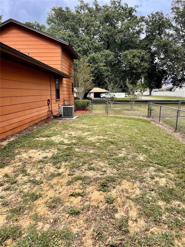 8504 N Campbell Rd, Lakeland, FL 33810 - view of yard with central AC