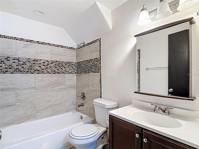 11704 Raintree Village Blvd Unit B, Temple Terrace, FL 33617 - bathroom with vanity, bathtub / shower combination, a textured wall, and lofted ceiling