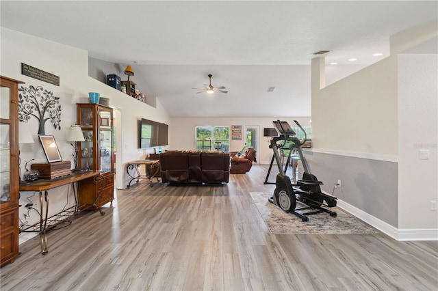 1531 Blue Sky Blvd, Haines City, FL 33844 - living area with ceiling fan, light wood-style flooring, and high vaulted ceiling