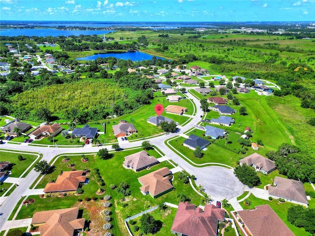 1531 Blue Sky Blvd, Haines City, FL 33844 - aerial perspective of suburban area with a nearby body of water