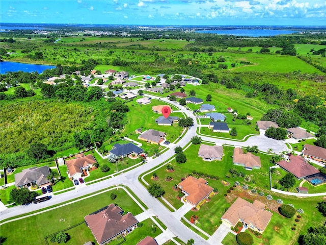 1531 Blue Sky Blvd, Haines City, FL 33844 - aerial view of residential area featuring a large body of water