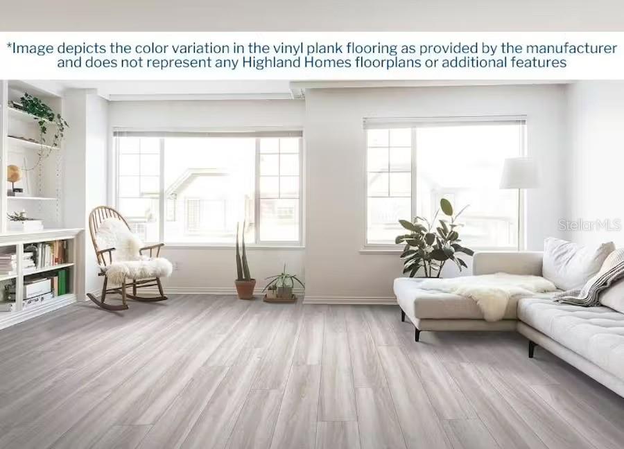 848 Cypress Creek Run, Saint Cloud, FL 34771 - living area featuring wood finished floors, baseboards, and plenty of natural light