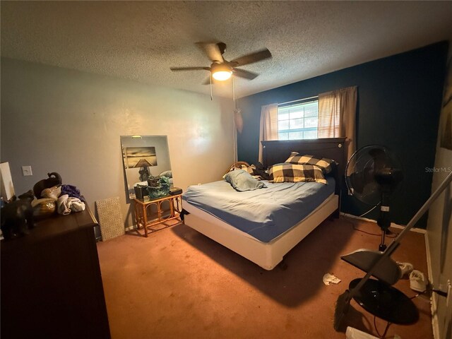 2424 Bates Ave SW, Winter Haven, FL 33880 - bedroom with carpet floors, a textured ceiling, and ceiling fan