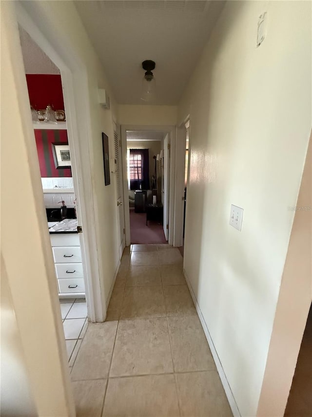 2424 Bates Ave SW, Winter Haven, FL 33880 - corridor with light tile patterned flooring