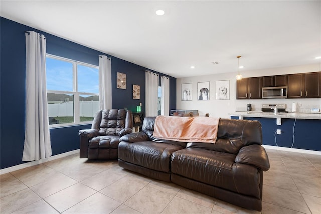 3685 Diving Dove Ln, Bartow, FL 33830 - living area featuring plenty of natural light, light tile patterned floors, and recessed lighting