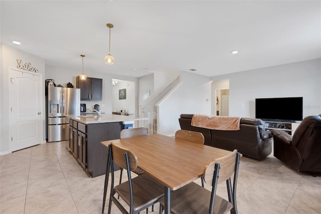 3685 Diving Dove Ln, Bartow, FL 33830 - dining space featuring stairway, light tile patterned floors, and recessed lighting