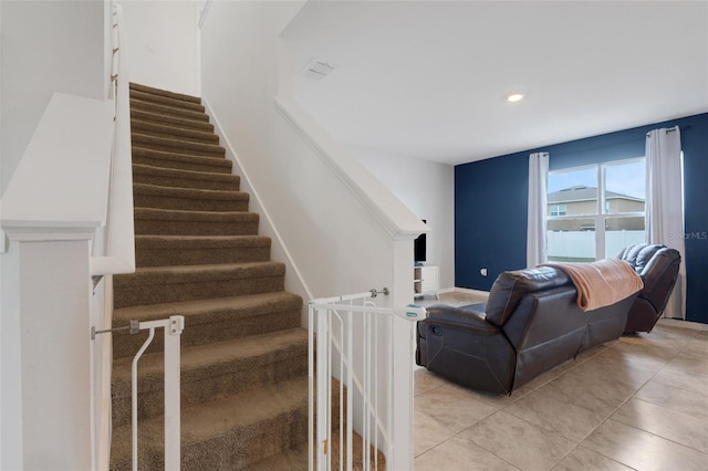 3685 Diving Dove Ln, Bartow, FL 33830 - staircase with tile patterned floors and recessed lighting