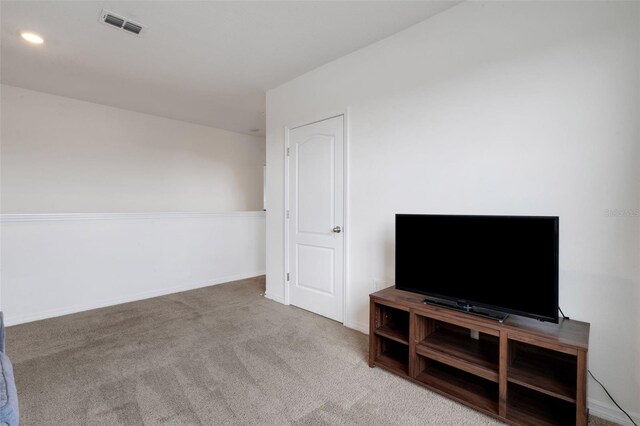 3685 Diving Dove Ln, Bartow, FL 33830 - unfurnished living room with carpet and recessed lighting