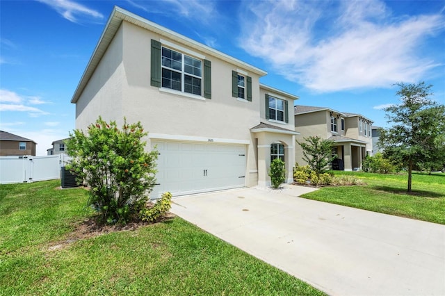 3685 Diving Dove Ln, Bartow, FL 33830 - traditional home with driveway, stucco siding, and an attached garage
