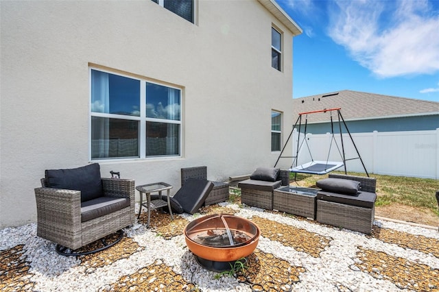 3685 Diving Dove Ln, Bartow, FL 33830 - view of patio featuring an outdoor living space with a fire pit