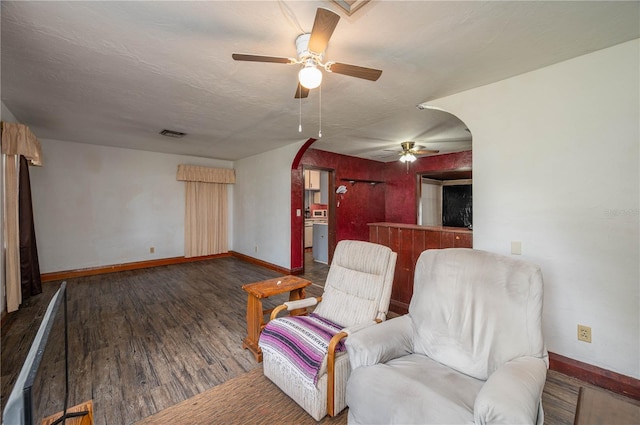 114 Pennsylvania Ave, Wauchula, FL 33873 - living area with ceiling fan, wood finished floors, and arched walkways