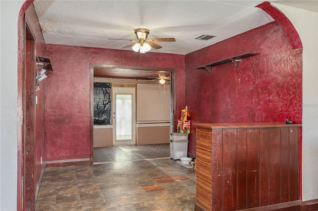 114 Pennsylvania Ave, Wauchula, FL 33873 - hall with baseboards and stone finish floors