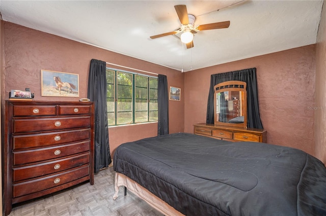 114 Pennsylvania Ave, Wauchula, FL 33873 - bedroom featuring a textured wall and a ceiling fan