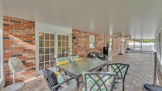 1910 Clubhouse Rd, Lakeland, FL 33813 - sunroom / solarium with outdoor dining area and a ceiling fan