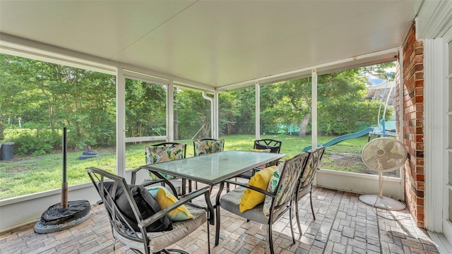 1910 Clubhouse Rd, Lakeland, FL 33813 - sunroom / solarium featuring outdoor dining space