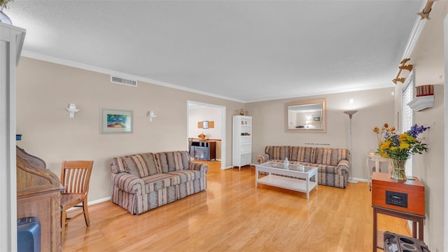 1910 Clubhouse Rd, Lakeland, FL 33813 - living room with crown molding, light wood finished floors, and baseboards