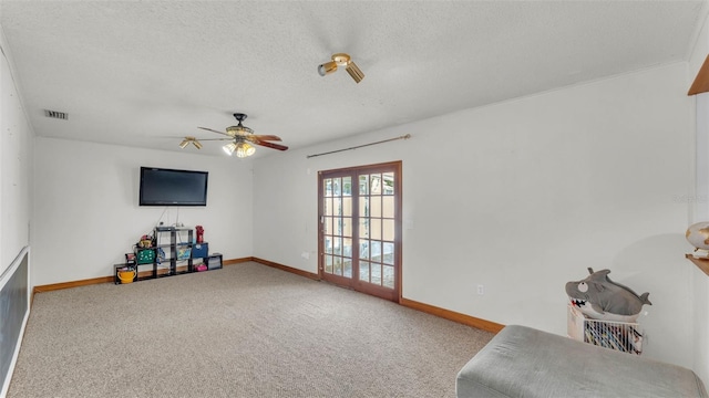 1910 Clubhouse Rd, Lakeland, FL 33813 - unfurnished room featuring carpet floors, a textured ceiling, baseboards, and a ceiling fan