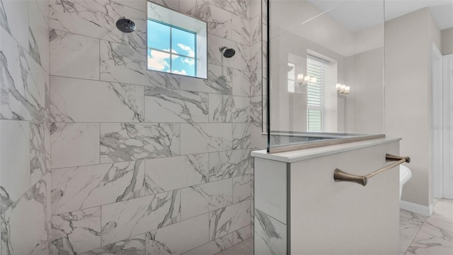 1385 Ewell Rd, Lakeland, FL 33811 - bathroom with healthy amount of natural light, walk in shower, and marble finish floors