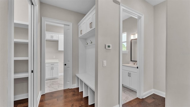 1385 Ewell Rd, Lakeland, FL 33811 - mudroom with a sink and dark wood-type flooring