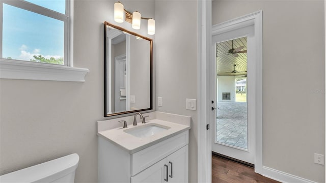 1385 Ewell Rd, Lakeland, FL 33811 - half bathroom with vanity and wood finished floors