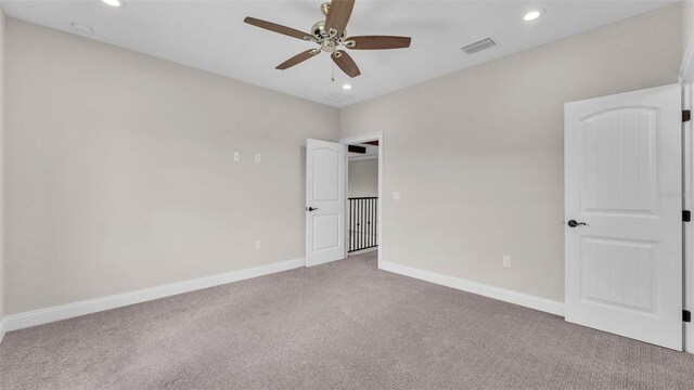 1385 Ewell Rd, Lakeland, FL 33811 - unfurnished bedroom with carpet, recessed lighting, and a ceiling fan