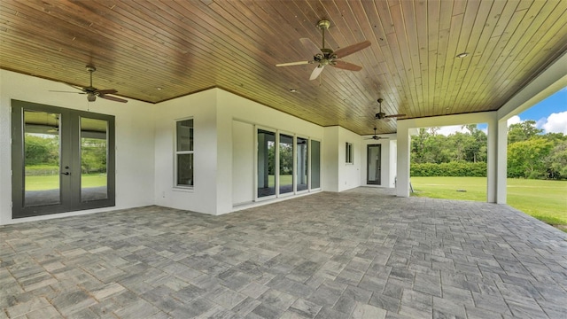 1385 Ewell Rd, Lakeland, FL 33811 - view of patio / terrace with a ceiling fan and french doors