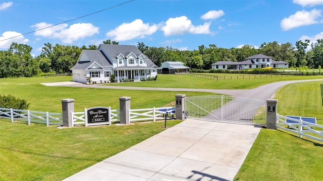 1385 Ewell Rd, Lakeland, FL 33811 - fenced yard featuring a gate and concrete driveway