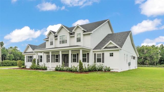 1385 Ewell Rd, Lakeland, FL 33811 - view of front of home with roof with shingles and covered porch