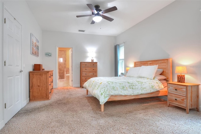 1145 Denton St, Lakeland, FL 33803 - bedroom featuring light colored carpet, ceiling fan, and connected bathroom