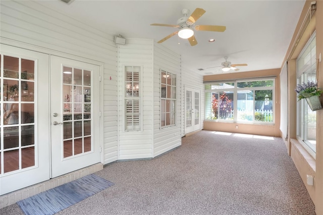 1145 Denton St, Lakeland, FL 33803 - unfurnished sunroom featuring french doors and carpet floors