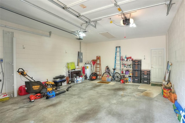 1145 Denton St, Lakeland, FL 33803 - garage featuring electric panel, a garage door opener, water heater, and concrete block wall