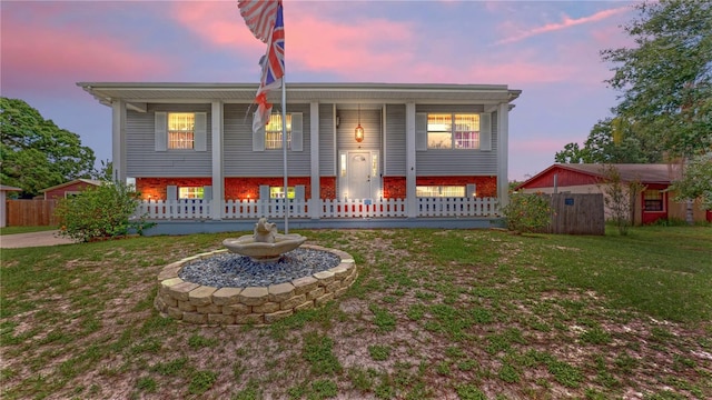 2333 Cheshire Pl, Lakeland, FL 33810 - bi-level home with covered porch and brick siding