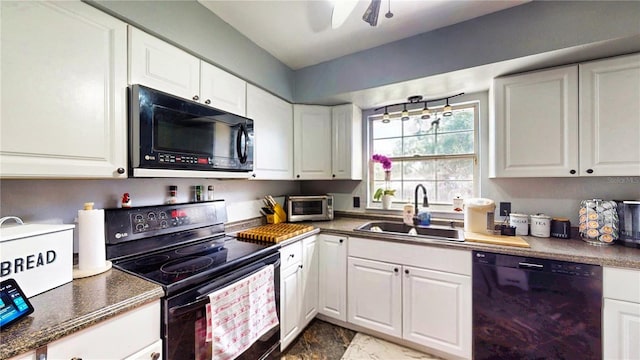 2333 Cheshire Pl, Lakeland, FL 33810 - kitchen featuring black appliances, white cabinetry, ceiling fan, and dark countertops