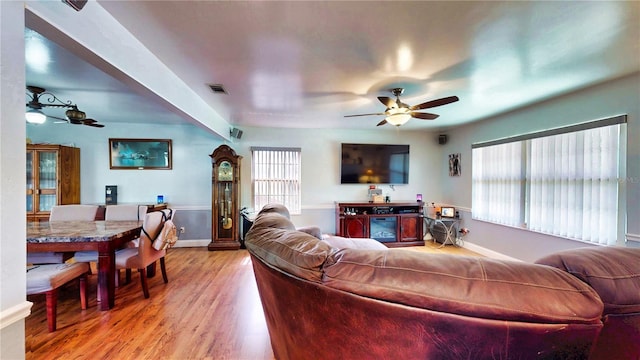 2333 Cheshire Pl, Lakeland, FL 33810 - living area featuring ceiling fan, baseboards, and light wood-type flooring