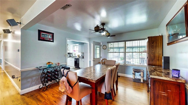 2333 Cheshire Pl, Lakeland, FL 33810 - dining space with ceiling fan, baseboards, and wood finished floors