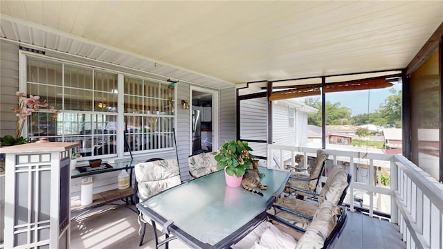 2333 Cheshire Pl, Lakeland, FL 33810 - sunroom featuring outdoor dining space
