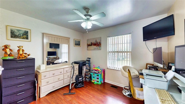 2333 Cheshire Pl, Lakeland, FL 33810 - office space with a ceiling fan, wood finished floors, and baseboards