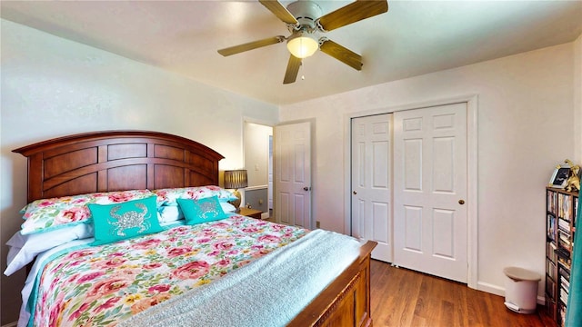 2333 Cheshire Pl, Lakeland, FL 33810 - bedroom featuring wood finished floors, a closet, and a ceiling fan