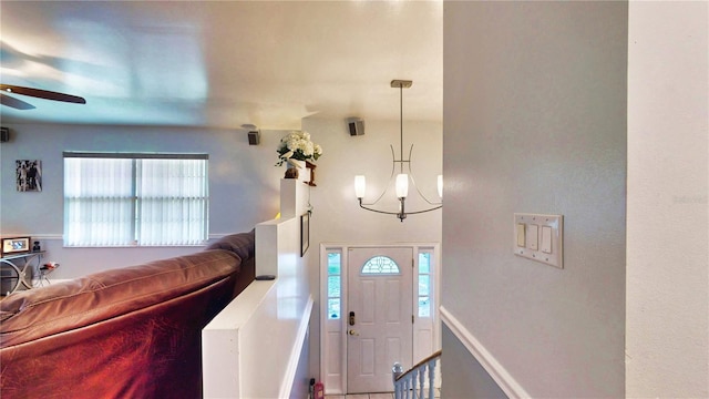 2333 Cheshire Pl, Lakeland, FL 33810 - foyer entrance featuring a ceiling fan and plenty of natural light