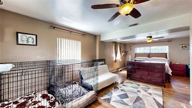 2333 Cheshire Pl, Lakeland, FL 33810 - bedroom featuring wood finished floors and a ceiling fan