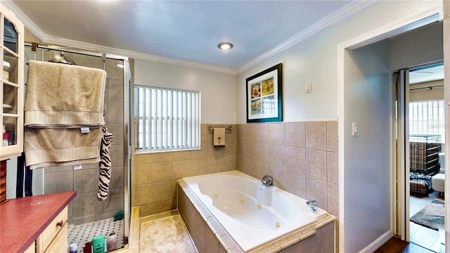 2333 Cheshire Pl, Lakeland, FL 33810 - bathroom featuring a shower stall, a whirlpool tub, crown molding, tile walls, and vanity