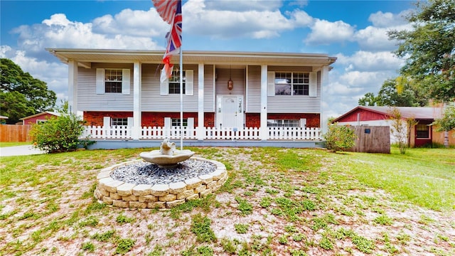 2333 Cheshire Pl, Lakeland, FL 33810 - bi-level home featuring covered porch and brick siding