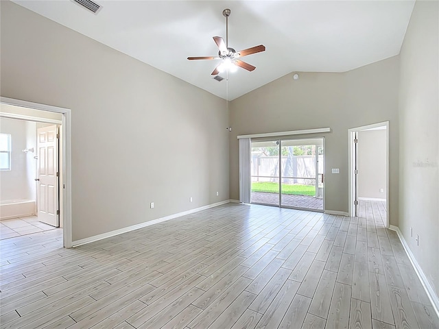 3806 Osprey Pointe Cir, Winter Haven, FL 33884 - unfurnished room with a ceiling fan, light wood-type flooring, and high vaulted ceiling