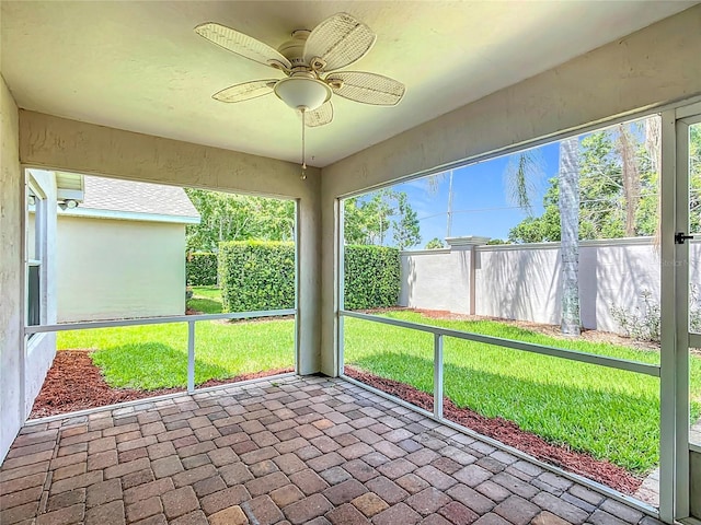 3806 Osprey Pointe Cir, Winter Haven, FL 33884 - unfurnished sunroom with ceiling fan