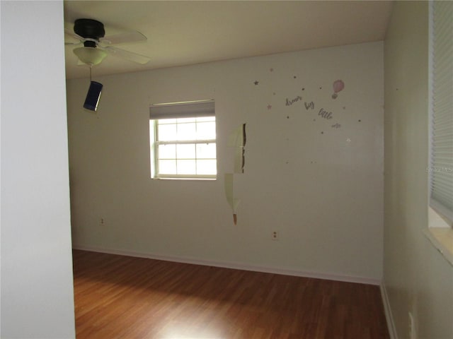 1440 Hackl Blvd, Bartow, FL 33830 - empty room featuring wood finished floors, a ceiling fan, and baseboards