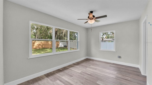 980 S Mill Ave, Bartow, FL 33830 - empty room featuring a ceiling fan and wood finished floors