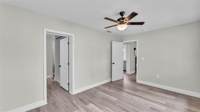980 S Mill Ave, Bartow, FL 33830 - unfurnished bedroom featuring light wood-type flooring and ceiling fan