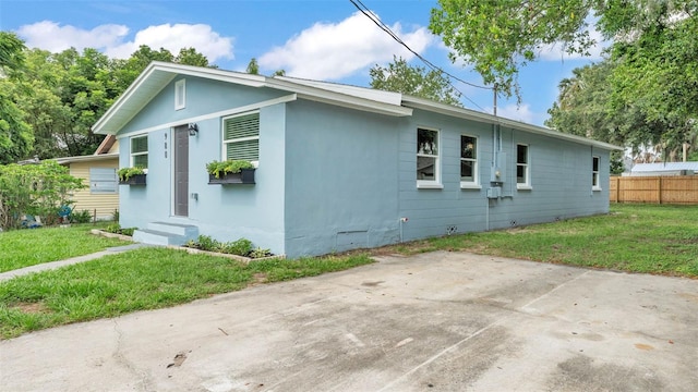 980 S Mill Ave, Bartow, FL 33830 - view of side of home featuring crawl space and a patio area