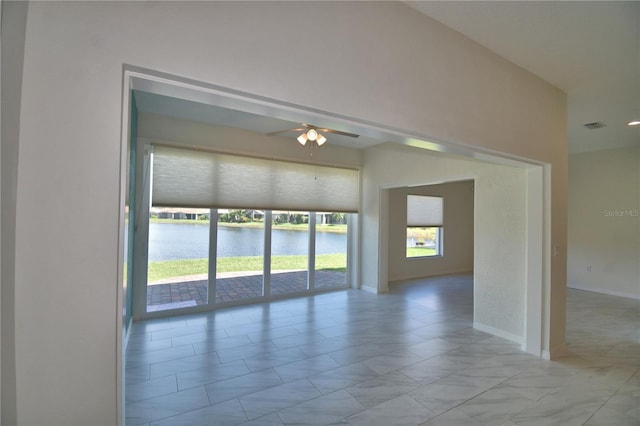 4188 Muirfield Loop, Lake Wales, FL 33859 - spare room with a ceiling fan and a water view