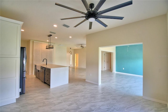 4188 Muirfield Loop, Lake Wales, FL 33859 - kitchen featuring open floor plan, a ceiling fan, stainless steel appliances, recessed lighting, and light countertops